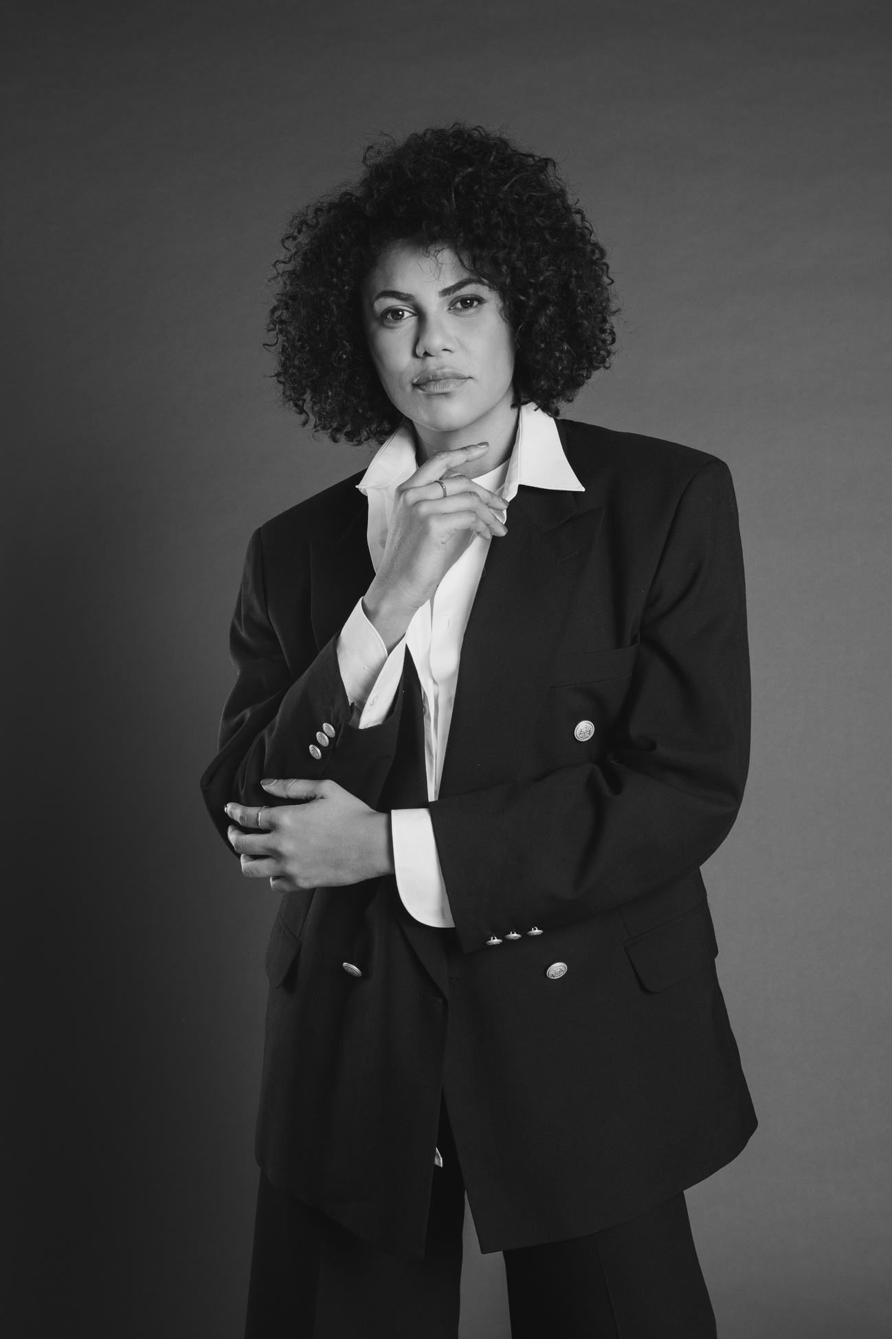 Portrait of a Fashionable Woman in Black Suit